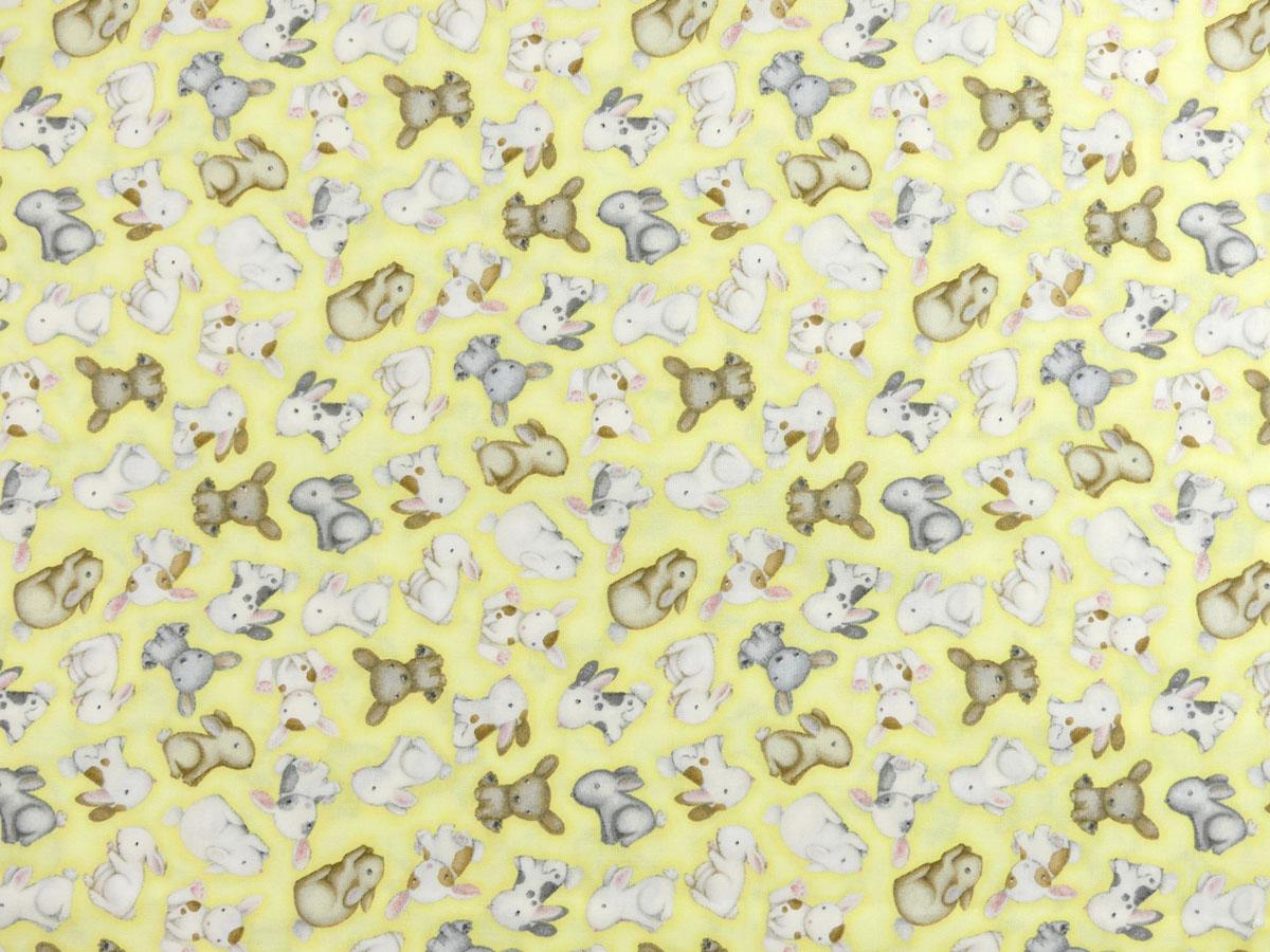 Patchworkstoff mit süßen Hasenbabies auf gelben Hintergrund